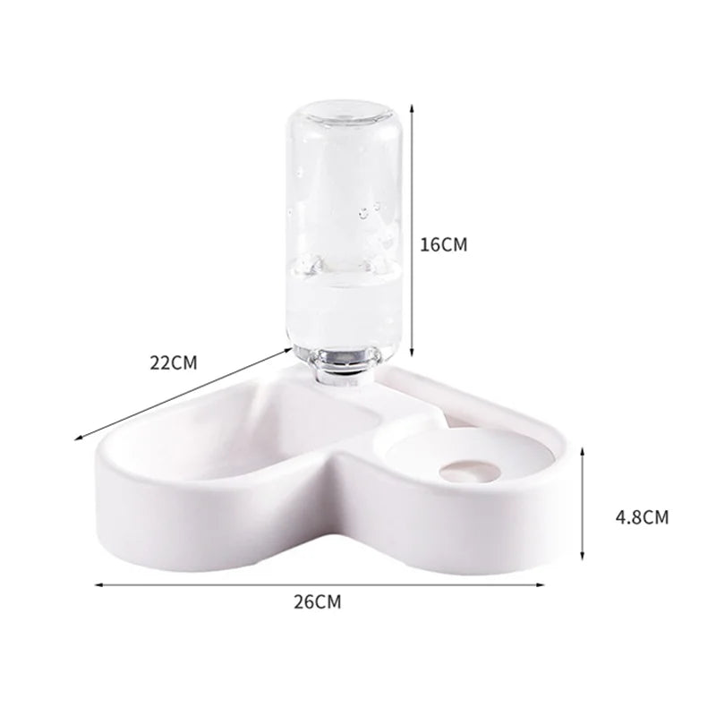 Pet eating from automatic dual-use bowl set up at home