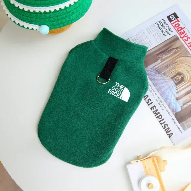 Folded fleece dog sweater showing compact storage