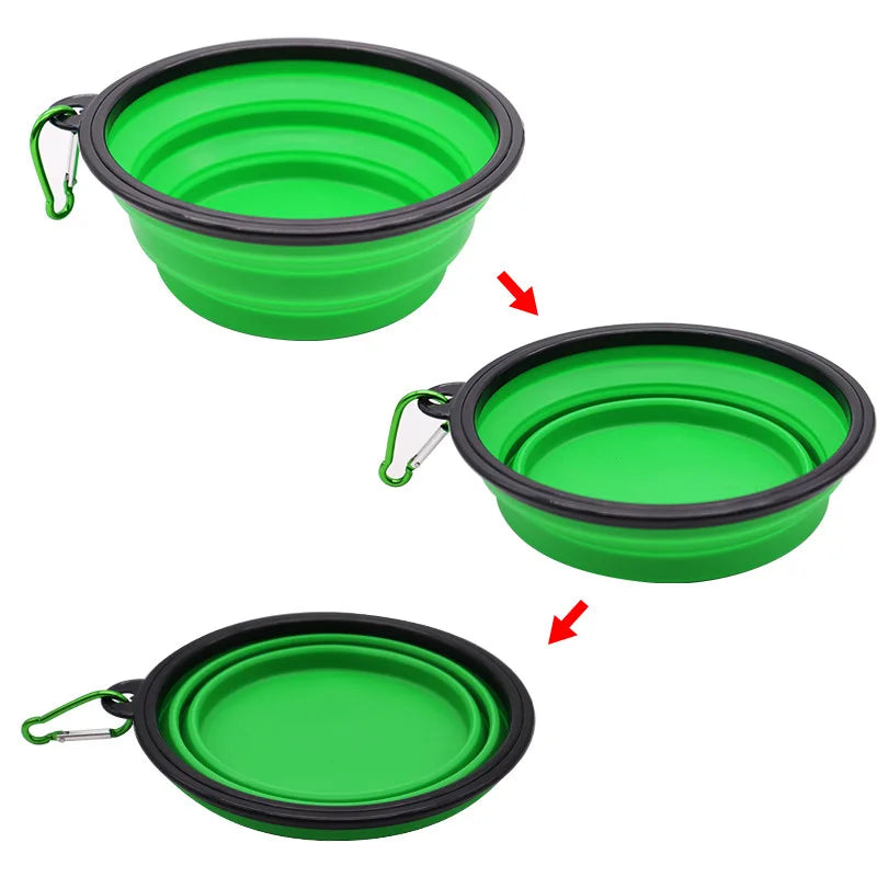Collapsible pet bowl clipped to backpack with keychain

